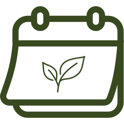 Calendar with a seedling representing seasonal planting timing.